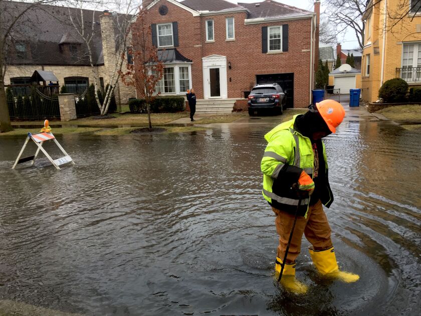 A water main broke and flooded Kilpatrick Avenue near Caldwell Avenue in the Sauganash neighborhood on Chicago’s Northwest Side. | Stefano Esposito/Sun-Times