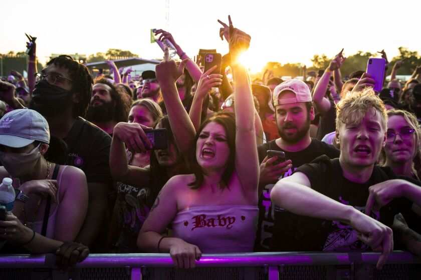 Fans cheer as Vic Mensa performs on Day 3 of Riot Fest.