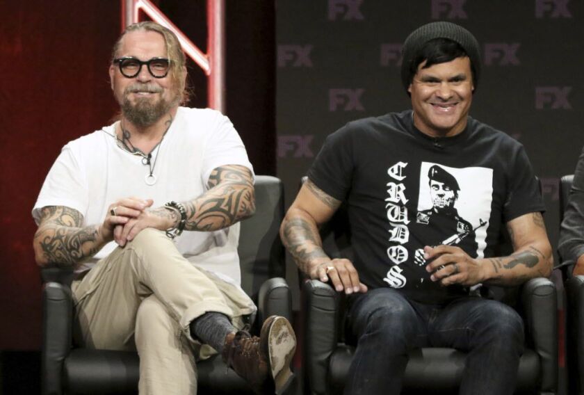 “Mayans M.C.” co-creators Kurt Sutter (left) and Elgin James discuss the show with reporters. | AP