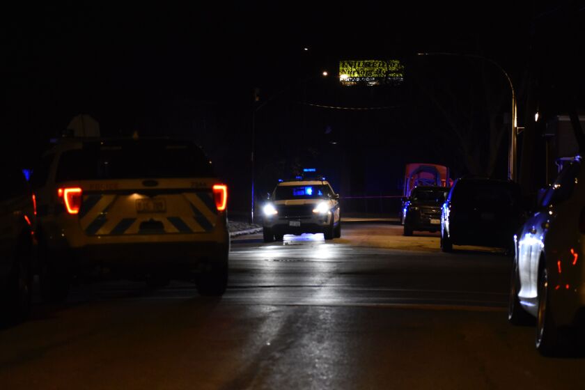 Chicago police respond to a shooting that killed a 17-year-old boy Feb. 22, 2020, in Grand Crossing.