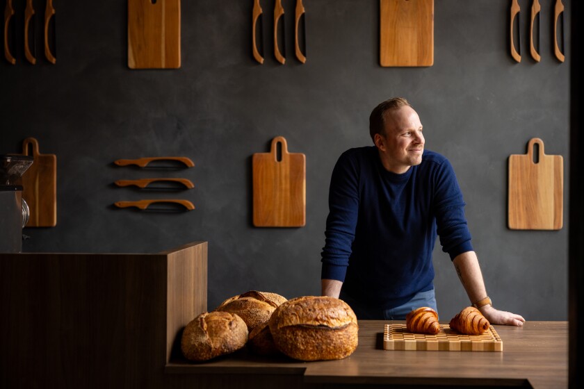 Owner Daniel Koester stands behind the counter at Bad Butter in Bucktown