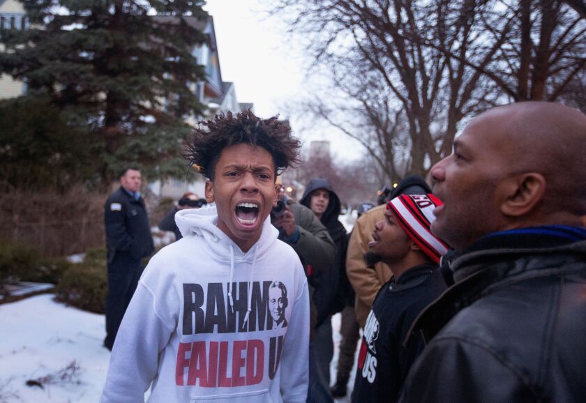 Demonstrators protest outside of Mayor Rahm Emanuel’s home on December 29, 2015.