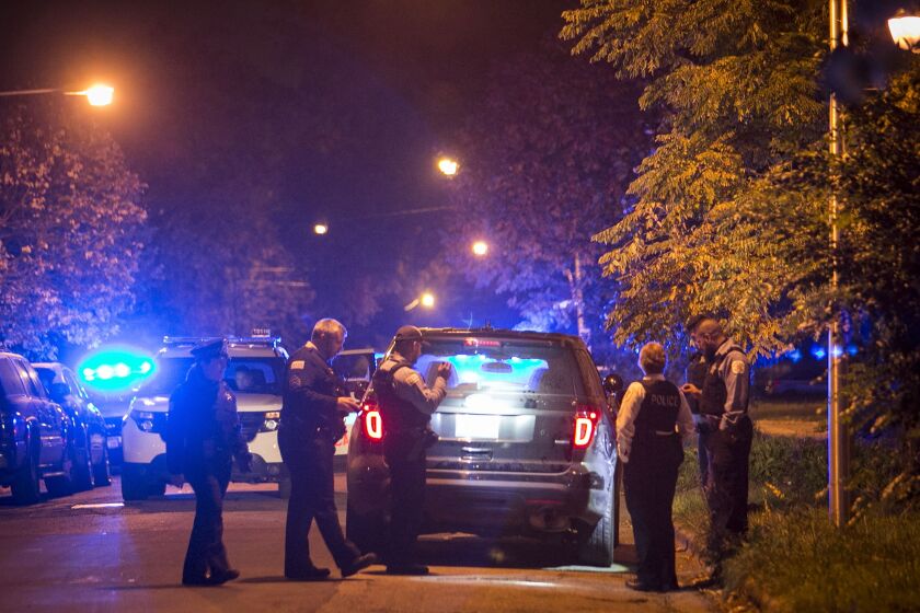 Chicago Police investigate in the 1500 block of South Christiana, where a 20-year-old man was shot to death early Sunday, Oct. 23, 2016. | Ashlee Rezin/Sun-Times