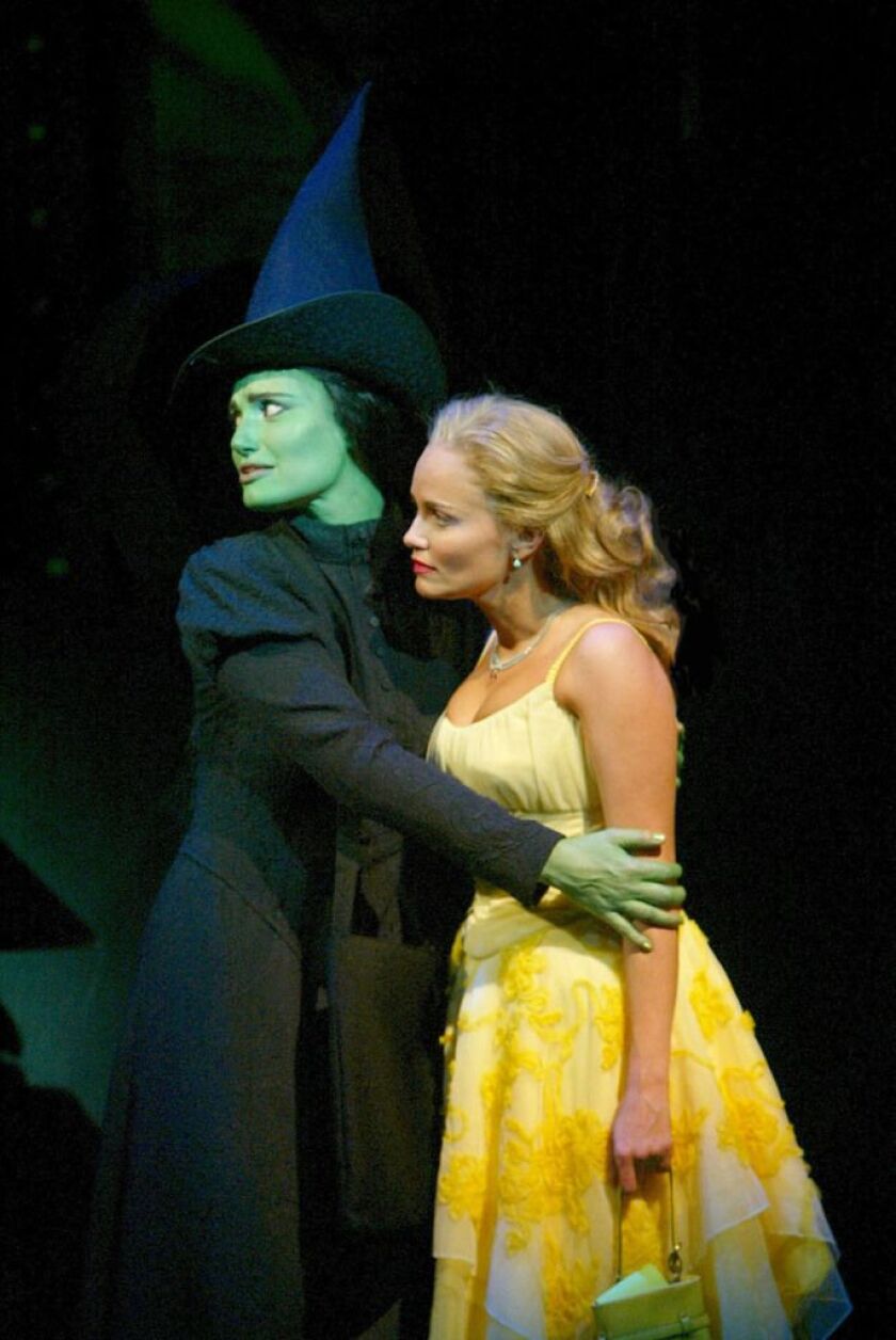Idina Menzel (left) and Kristin Chenoweth in a scene from “Wicked,” the Broadway musical.| AP Photo/ Joan Marcus, File