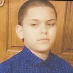 Xavier Contreras was one of 10 children who died in a fire early Sunday in the 2200 block of South Sacramento Avenue in Little Village. | Sun-Times photo by Ashlee Rezin of family photo on display at memorial