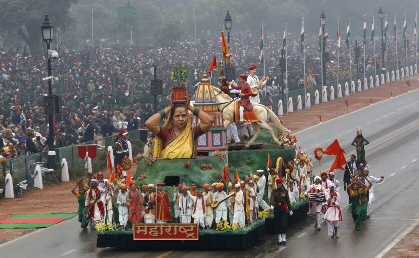 A tableau representing western Maharashtra state moves past during the Republic Day parade in New Delhi, India, Monday, Jan. 26, 2015. Republic Day marks the anniversary of Indias democratic constitution taking force in 1950. (AP Photo /Manish Swarup)