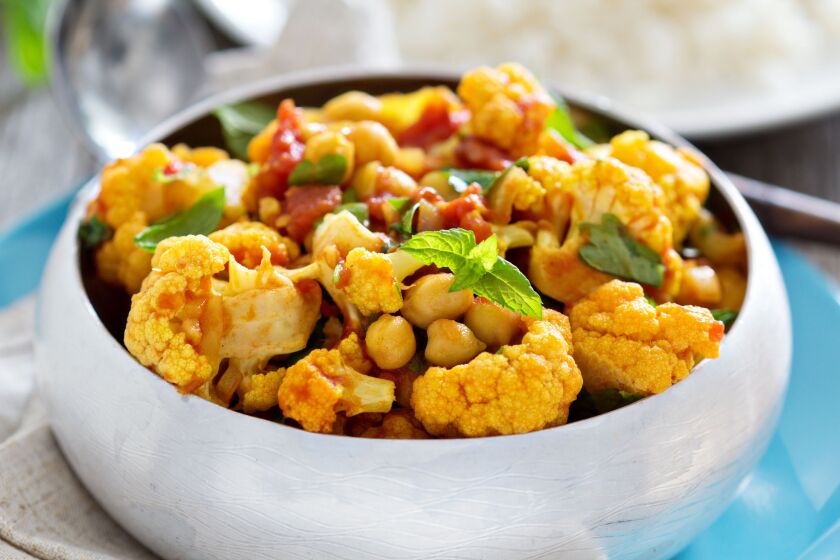 Chickpea curry is a highly versatile dish, as you can opt to make it vegan or not.