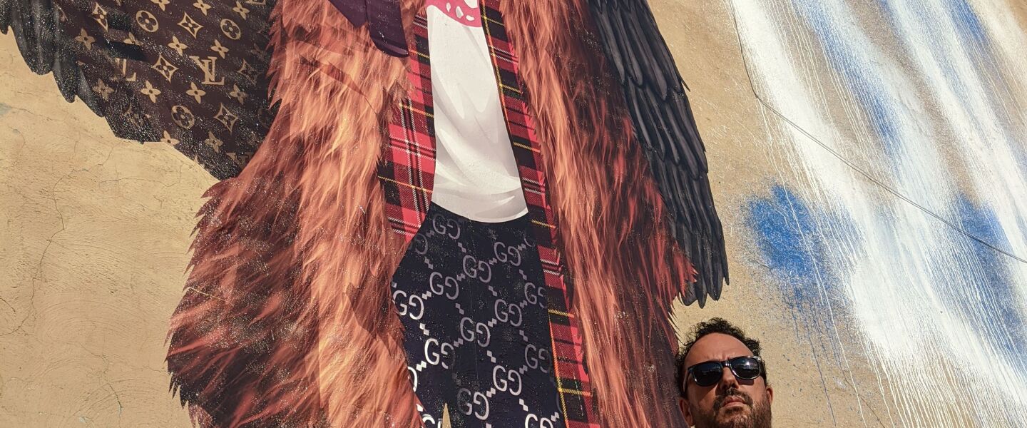 Chris Devins painted his Juice WRLD mural on the side of a building at 737 W. 59th St.