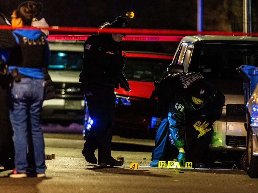 Police investigate the scene where two teenage women were shot to death Monday night in the 7700 block of South Eggleston. | Tyler LaRiviere/Sun-Times