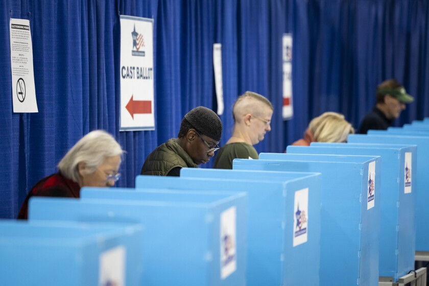 Chicagoans vote on key local races and pivotal presidential contest ...