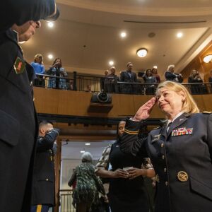 Women veterans of every branch of the U.S. military, file through an auditorium at the Pritzker Military Museum and Library for the announcement of the first all women honor flight to Washington D.C. later this year, Tuesday, Feb. 25, 2020.