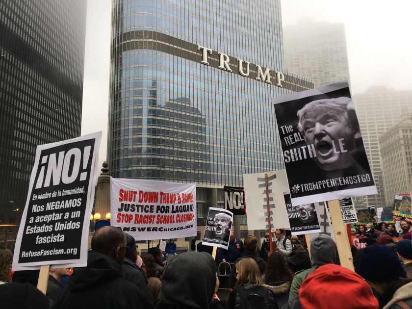 Hundreds of people attend an anti-Trump rally downtown on Sunday. | Mitch Dudek/Sun-Times