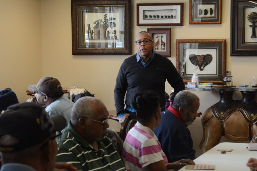 Ald. Howard Brookins campaigning for congressman at the New Pisgah Haven Homes, where he led the bingo game. February 25, 2016. Brian Jackson/ for the Sun-Times