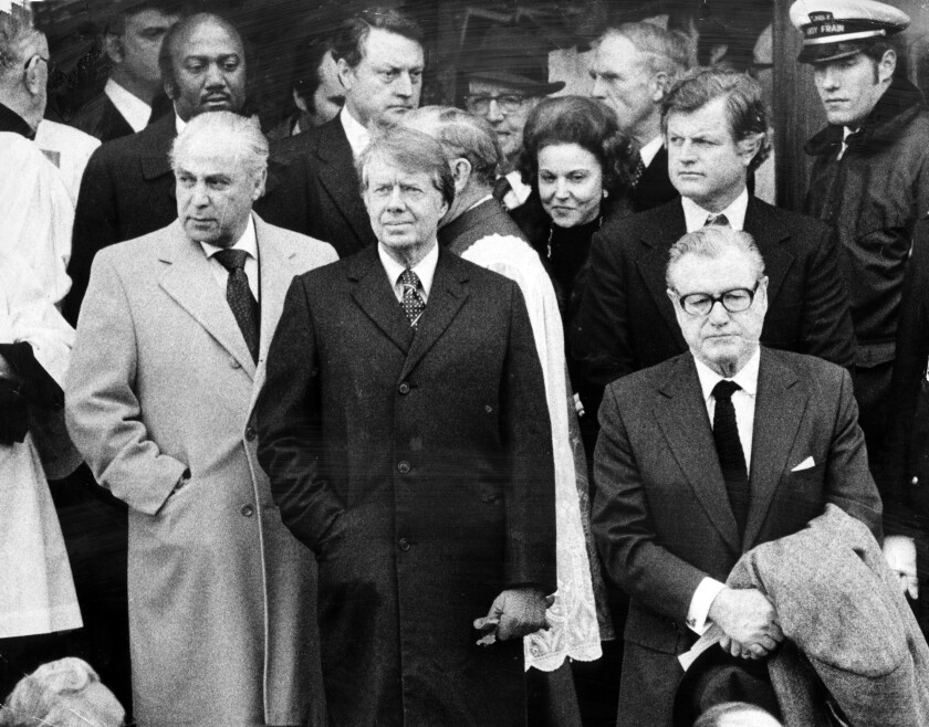 Leaving Nativity of Our Lord Church on Dec. 21, 1976, after funeral services for Mayor Richard J. Daley are (left to right) Robert S. Strauss, Democratic National Committee chairperson; President-elect Jimmy Carter; Sun-Times columnist Ann Landers; Sen. Edward M. Kennedy (D-Mass); and Vice President Nelson A. Rockefeller.