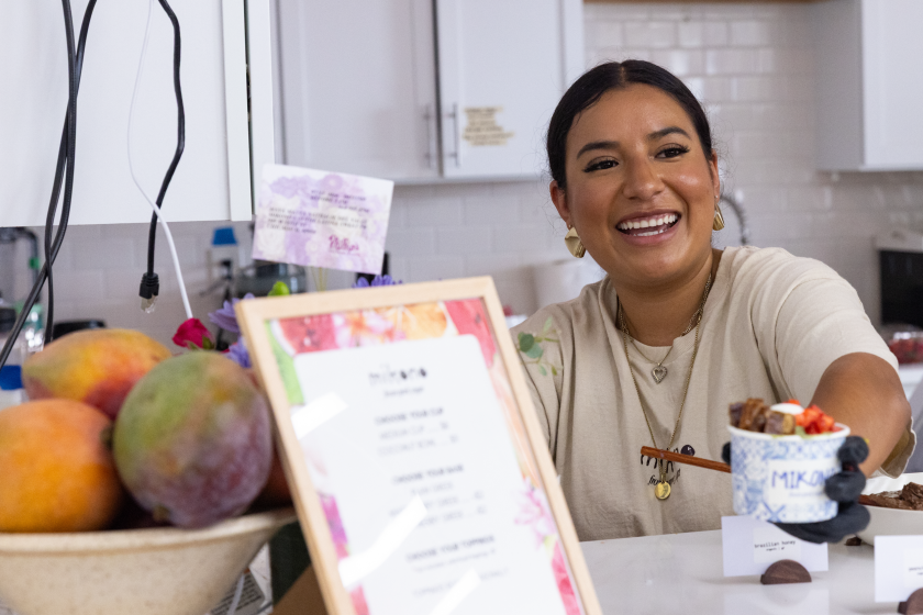 Co-owner Maya Matta serves customers at Mikono, a Greek frozen yogurt shop in Pilsen on the Southwest Side, Monday, July 13, 2026.