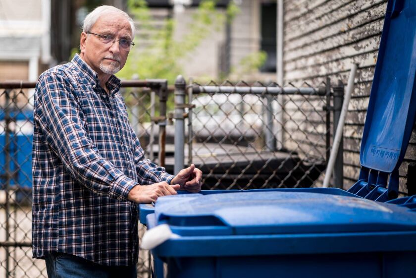Peter Bencak, 67, shows how he separates recyclables. | Better Government Association