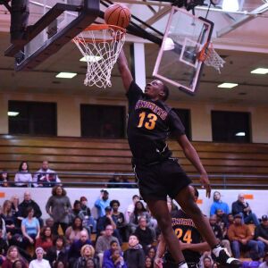 St. Mel’s Deion Jackson (13) misses an open layup. Worsom Robinson/For the Sun-Times.