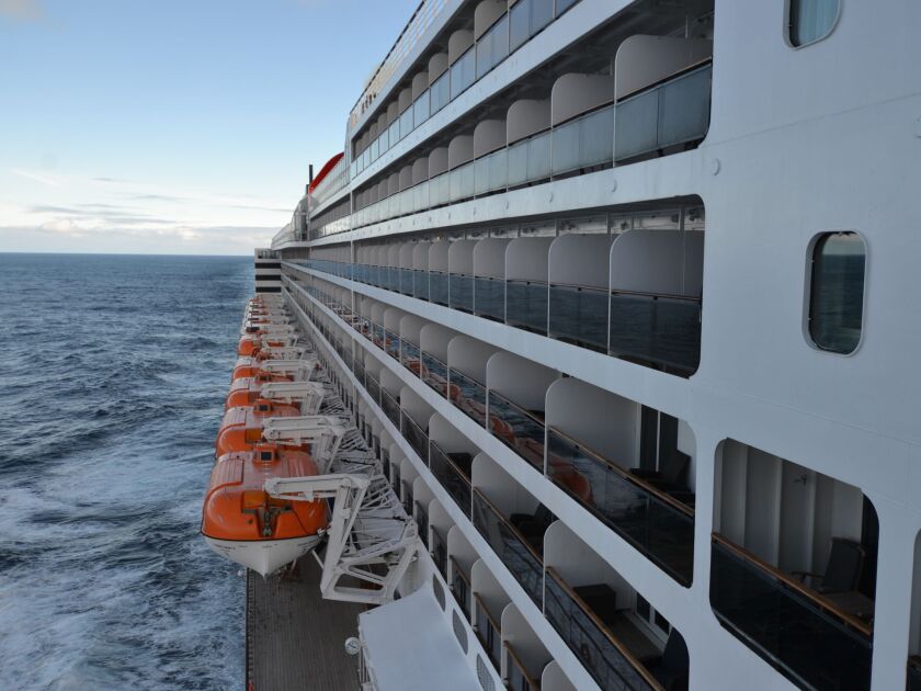 From a bumped-out wing of the Observation Deck, passengers can look back cross the superstructure of the Queen Mary 2. | Gene Sloan, USA TODAY