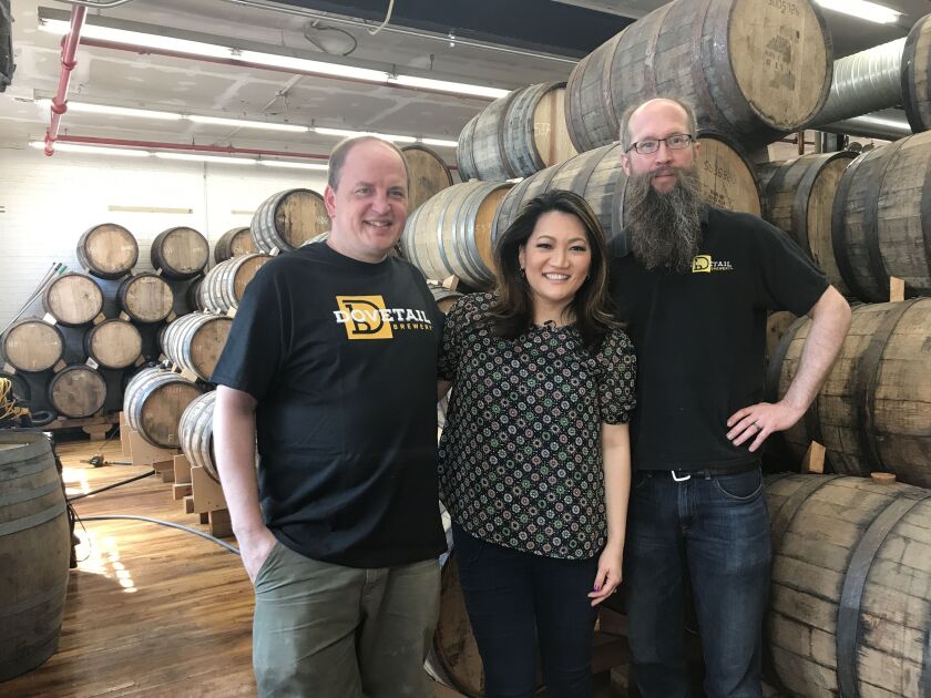 Dovetail co-owners/brewers Hagen Dost and Bill Wesselink with Ji Suk Yi in Ravenswood. | Brian Rich/For the Sun-Times