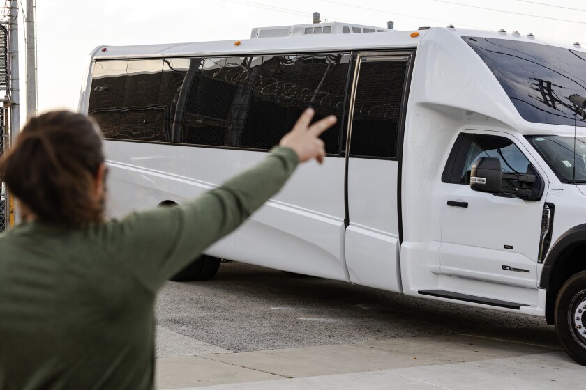 Abraham Aguirre watches a transport vehicle leave the Broadview ICE detainment facility that may have his relative inside on Sunday September 21, 2024. | Jim Vondruska/For the Sun-Times