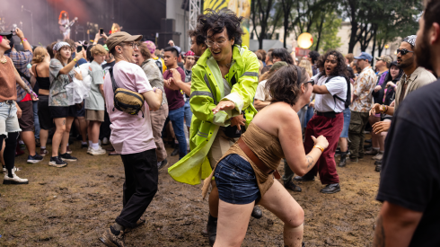 Die Spitz fans do circle pits near the Airbnb stage on Day 3 of Lollapalooza in Grant Park, Saturday, Aug. 1, 2026.
