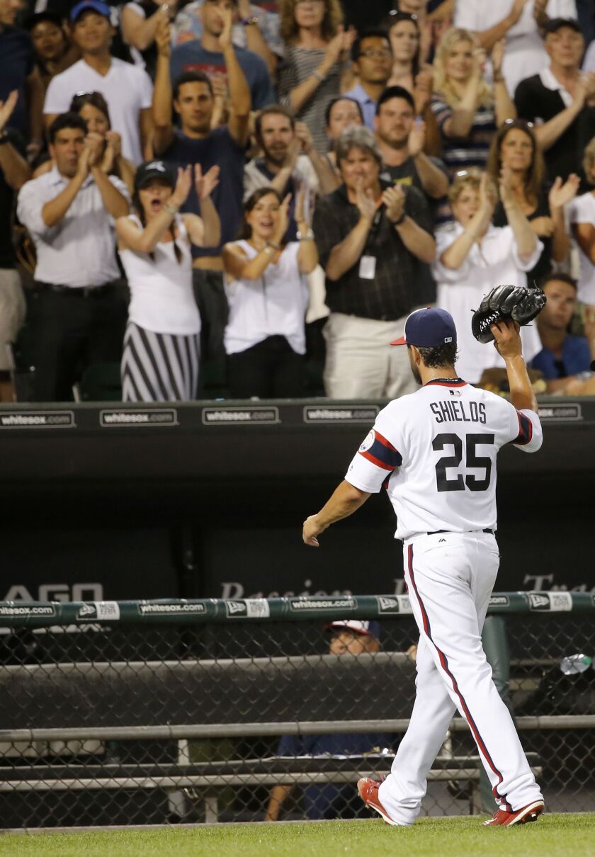 <em>James Shields acknowledges the crowd during the eighth inning Tuesday. (AP Photo/Charles Rex Arbogast)</em>