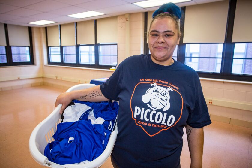 Amethyst Ramos is a parent volunteer who helps by doing the laundry for students at Piccolo Elementary Specialty Schoo. | James Foster/For the Sun-Times