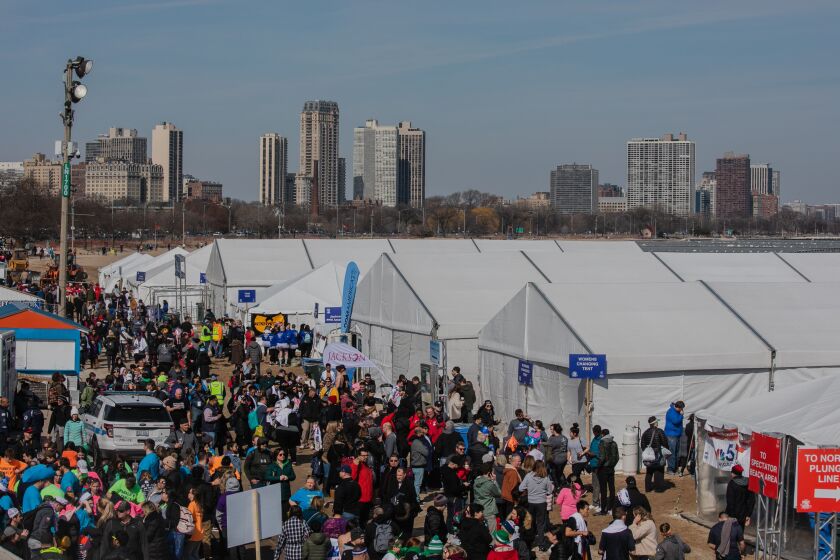 Thousands were greeted with 50-degree temperatures as they dove into the frigid waters of Lake Michigan at North Avenue Beach for the 20th annual Chicago Polar Plunge to benefit Special Olympics Chicago, Sunday morning, March 1, 2020.