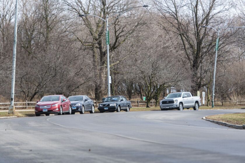 Cars park along West Montrose Harbor Drive near Montrose Harbor Thursday afternoon. The streets near Montrose Harbor and Montrose beach will soon be metered parking.