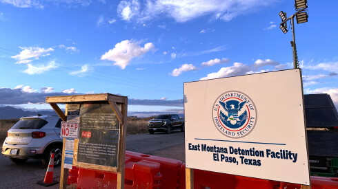 A sign marks the entrance to a series of hardened tents at the Camp East Montana immigrant detention center in the desert at a U.S. Army base on the outskirts of El Paso, Texas.