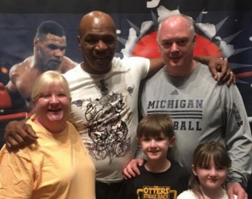 Mary Burke-Griffin and her husband, Martin, organized a trip to Las Vegas where their children, Bridget and Marty, met boxer Mike Tyson, the magicians Penn and Teller and an Elvis impersonator. | Family photo