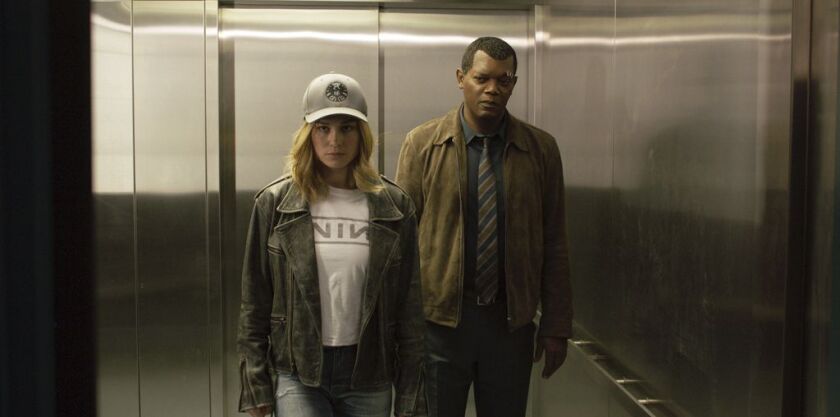 Samuel L. Jackson (with Brie Larson) is digitally “de-aged” in “Captain Marvel” to look like Nick Fury back when he was a mere mid-level S.H.I.E.L.D. bureaucrat. | Disney-Marvel Studios