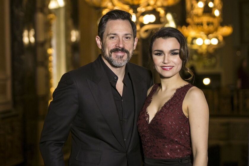 Actors Steve Kazee and Samantha Barks, who star as Edward and Vivian in the upcoming world premiere of “Pretty Woman: The Musical,” pose for a photo during the welcome press conference for the production at Chicago’s Oriental Theatre, Monday, Feb. 26, 201