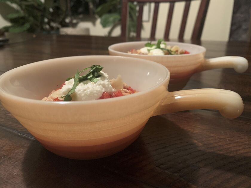This image provided by Tracee Herbaugh depicts two vintage peach lustre Fire King chili bowls. There are lustrous chili bowls with handles, stackable refrigerator boxes, and casserole dishes set on top of brass candle warmers. These are durable dishes, often smaller than modern serving pieces, that can go from freezer to oven to table. But collectors usually acquire them for enjoyment, not utility.