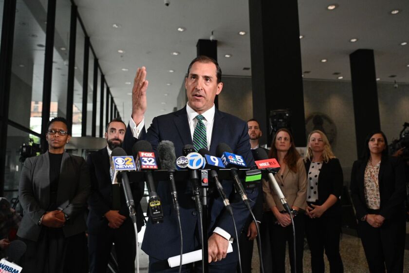 U.S. Attorney John Lausch speaks Wednesday in the lobby of the Dirksen Federal Courthouse in Chicago.