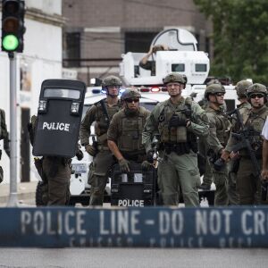 Chicago police SWAT officers respond to reports of looting and rioting near West Madison Street and South Karlov Avenue on the West Side, Monday afternoon, Aug. 10, 2020.