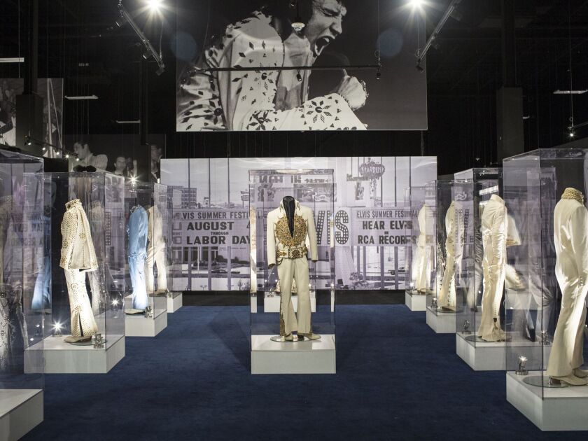 A collection of Elvis Presley’s jumpsuits are seen inside of the Elvis the Entertainer Career Museum at Elvis Presley’s Memphis. Elvis Presley Enterprises opened the new complex that includes 200,000 square feet of new exhibits, museums and performance sp