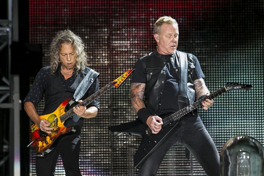 Kirk Hammett and James Hetfield of Metallica perform at Soldier Field on Sunday, June 18, 2017. | Ashlee Rezin/Sun-Times