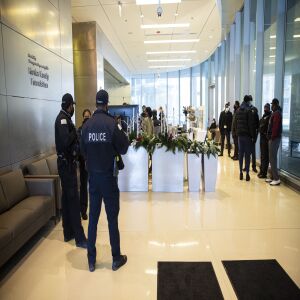 Chicago police officers wait in the hallway at the University of Chicago Medical Center in Hyde Park to hear news about a fellow officer who was shot while in his personal vehicle, Monday afternoon, March 15, 2021.