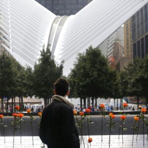 A man looks at the North Pool at the World Trade Center during a ceremony marking the 17th anniversary of the terrorist attacks on the United States. | AP Photo