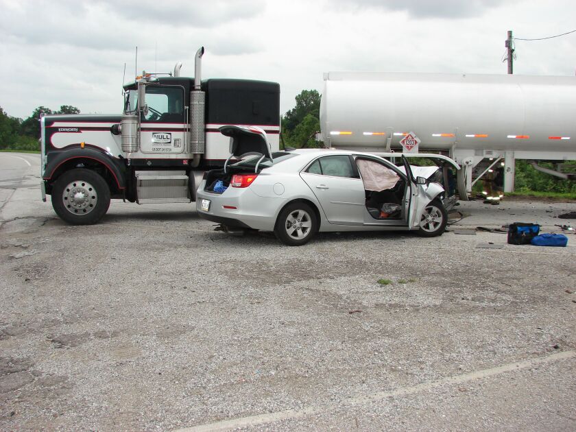 Two Markham men were injured when their car crashed into a semi on the off ramp from I-65 to SR 114 in Rensselaer, Ind., on Monday afternoon. | Indiana State Police