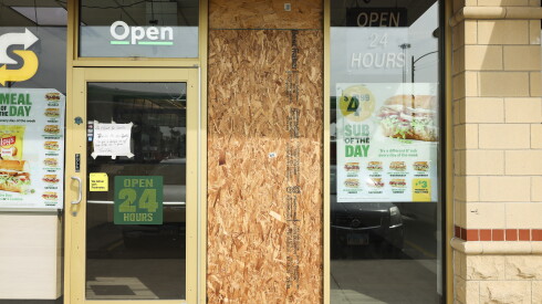 The damaged windows of a Subway that was hit by gun fire at the BP Gas Station where Mikquale T. Cooper, AKA BloodHound Q50, was shot and killed at 4248 S. Wentworth Ave. in Fuller Park, Monday, Sept. 14, 2026.