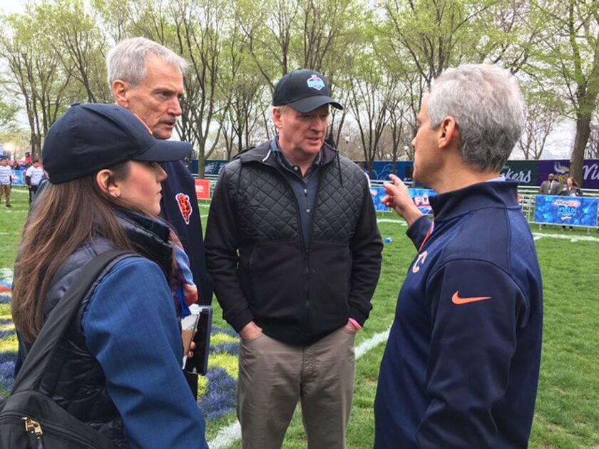 Bears Chairman George McCaskey (left), NFL Commissioner Roger Goodell and Chicago Mayor Rahm Emanuel chat Wednesday in Grant Park. | Fran Spielman/Sun-Times