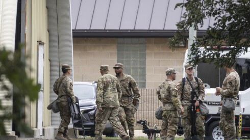 Members of the Texas National Guard at the U.S. Army Reserve Training Center in far southwest suburban Elwood Oct. 7.