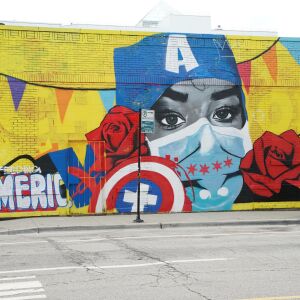 Artist Dwight White II painted a mural on the side of Lulu’s Hot Dogs, 1000 S. Leavitt St.