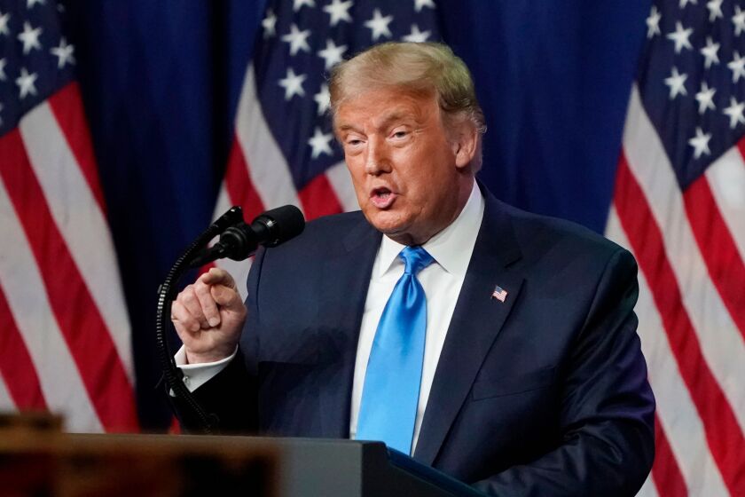 President Donald Trump speaks as delegates gather during the first day of the Republican National Convention in Charlotte, North Carolina.