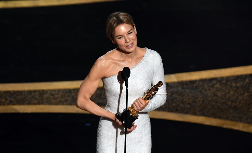 Renée Zellweger accepts the Actress in a Leading Role award for ‘Judy’ onstage during the 92nd Annual Academy Awards