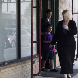 Nine-year-old Diogo, Lidia Souza’s son, walks out of the office of Heartland Alliance in Chicago. | Pat Nabong/For the Sun-Times