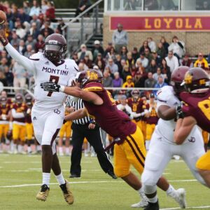 Montini’s Robert Brazziel (7) throws a pass. Allen Cunningham/For the Sun-Times.