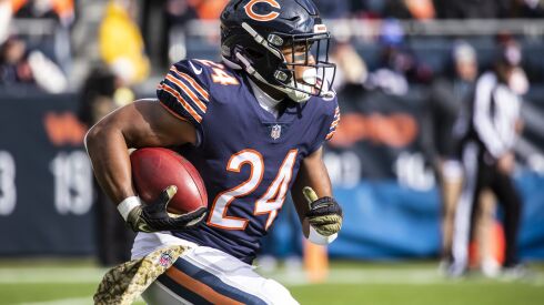 Chicago Bears running back Khalil Herbert #24 runs the ball during the first quarter against the Detroit Lions at Soldier Field on Sunday. | Ashlee Rezin/Sun-Times